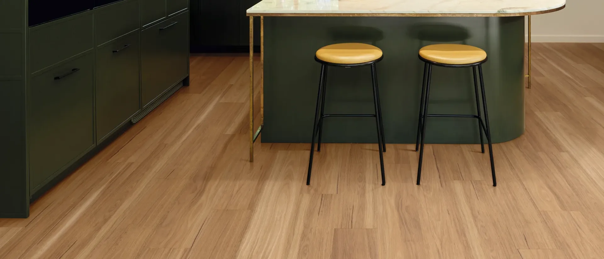 Korlok — green kitchen island, spotted gum planks, natural light