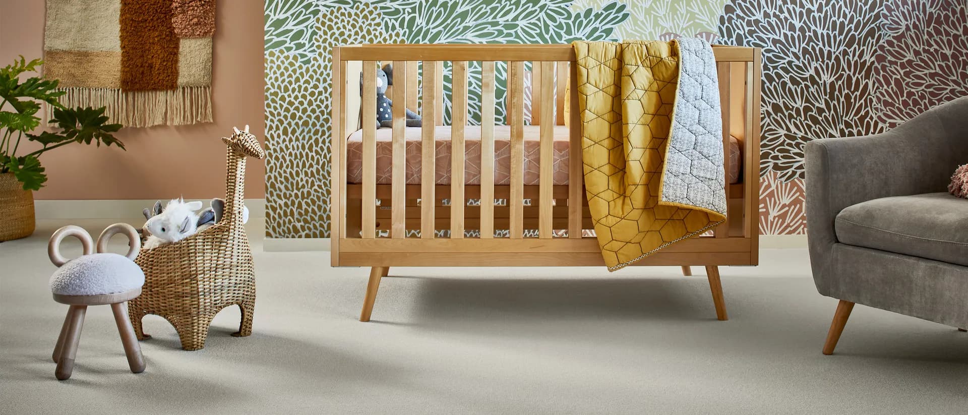 Nightfall — nursery with timber cot and pale grey carpet