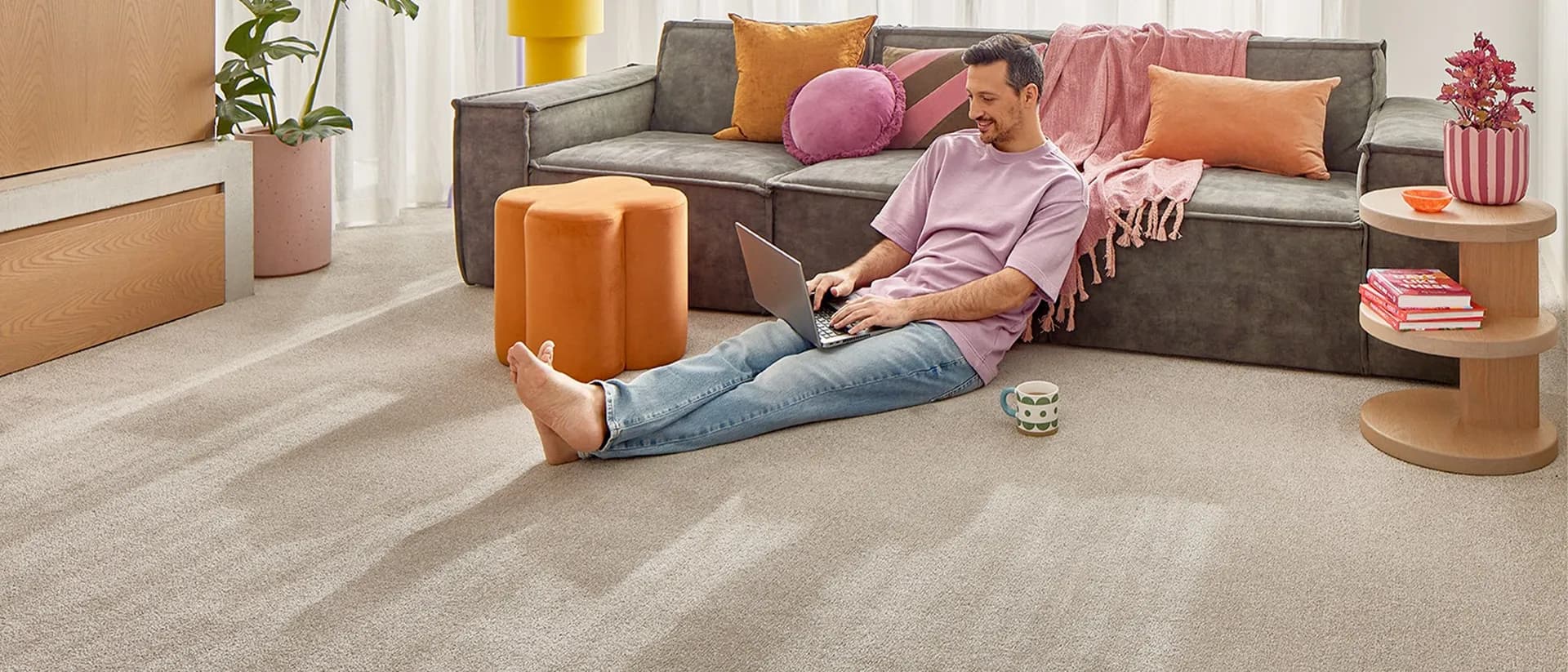 Velura — living room with beige carpet and natural light