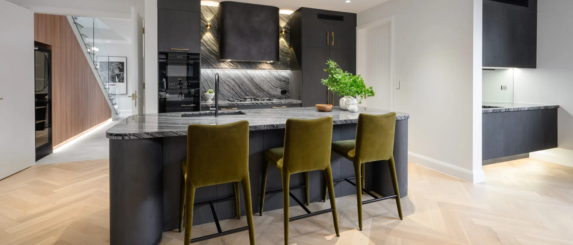 European Oak Collection — Herringbone — kitchen island with olive stools, oak herringbone floor