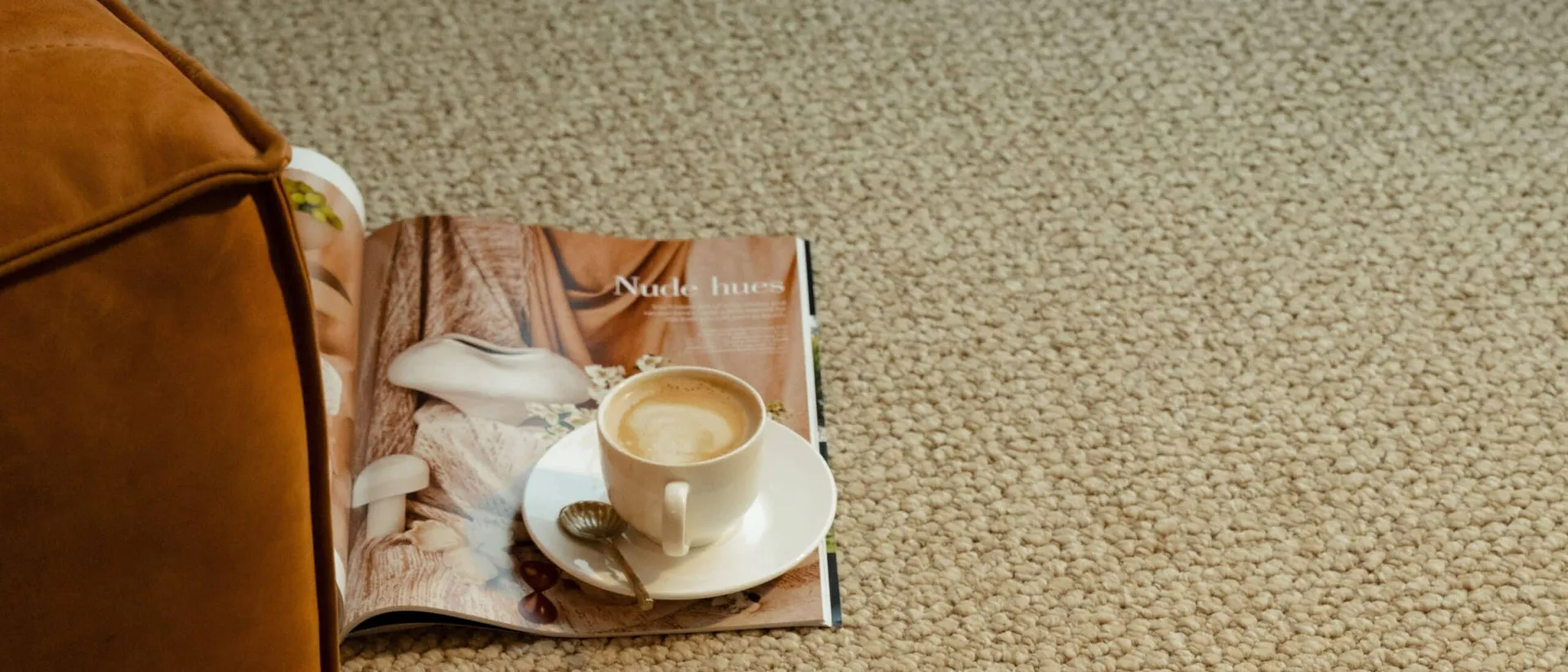 Flinders Gorge — tan leather sofa on carpet with warm daylight