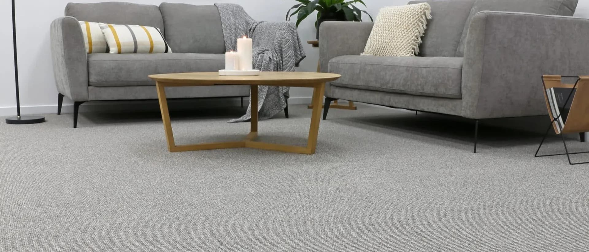 Langhorne Hut — living room, two grey sofas, round coffee table