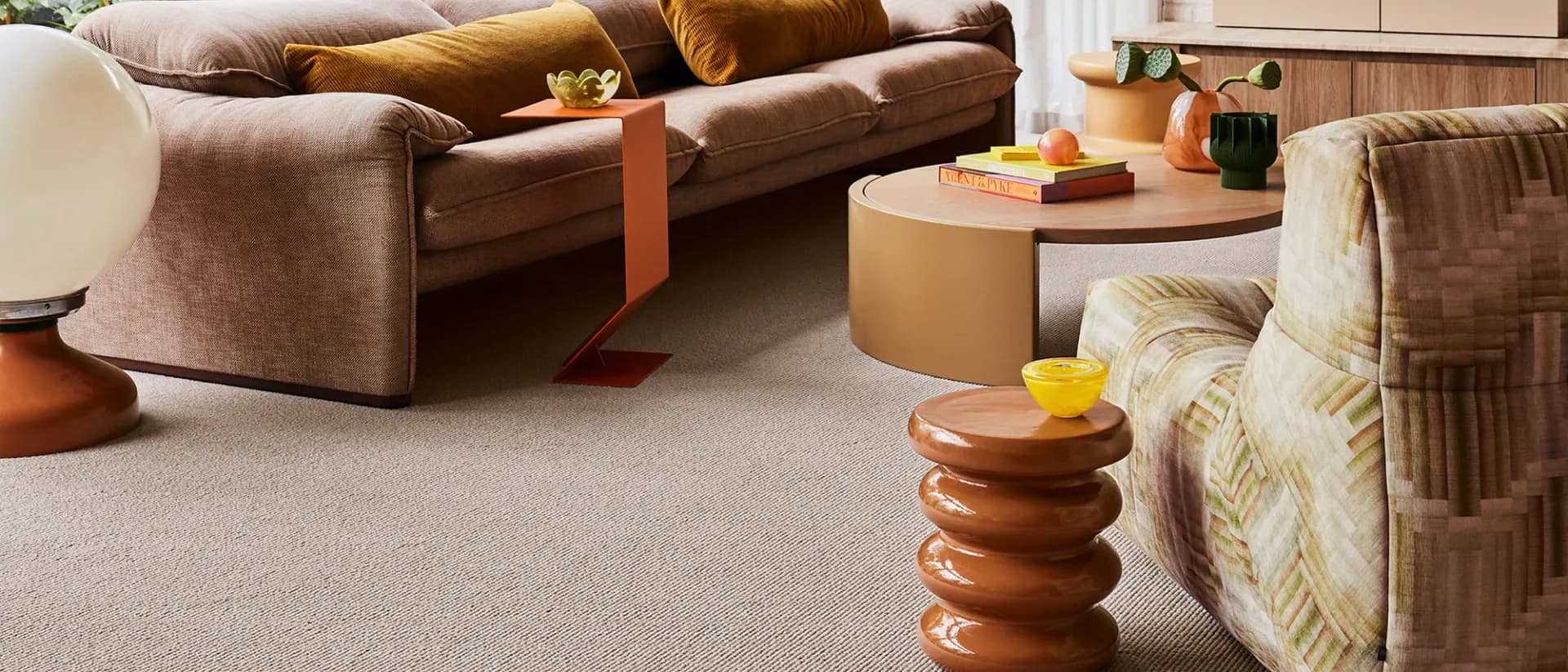 13th Beach — seventies-style living room, tan sofa, cactus garden view