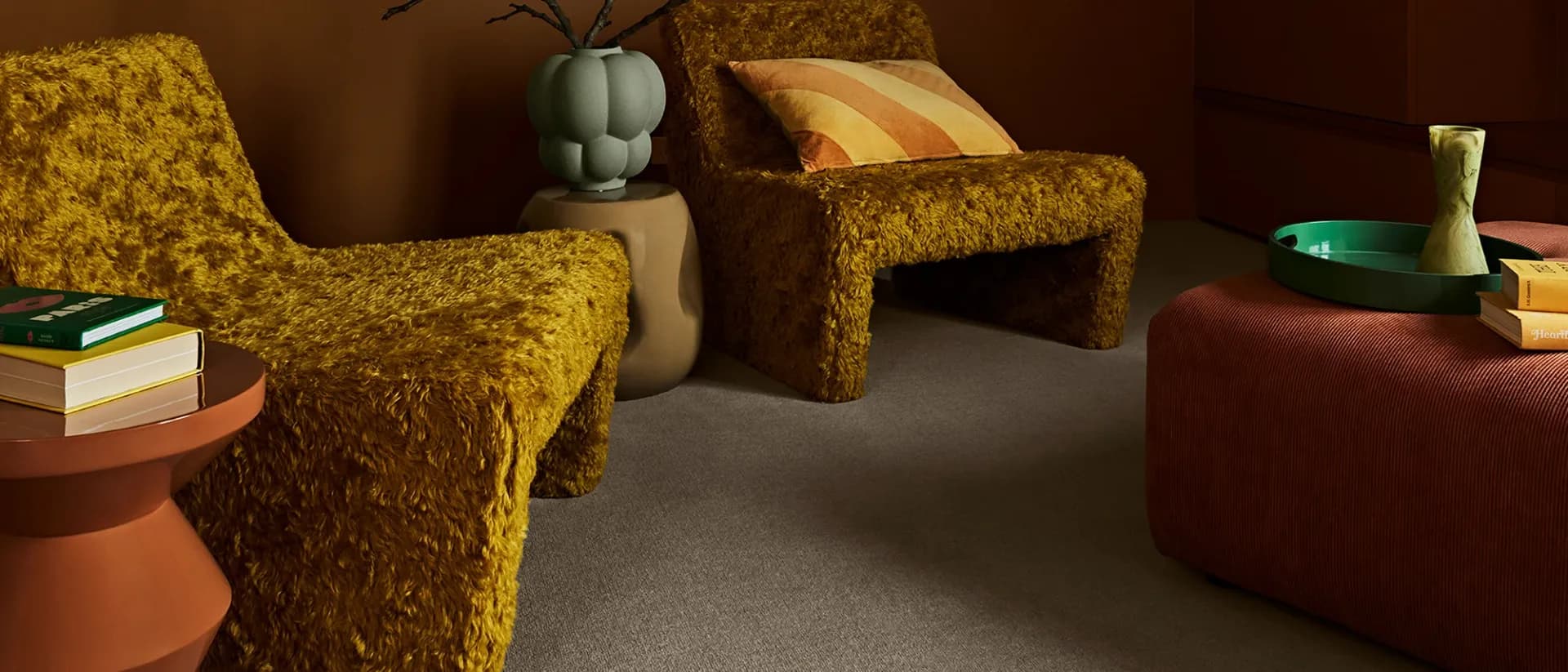 Berkley — moody brown lounge, mustard armchairs, grey plush carpet