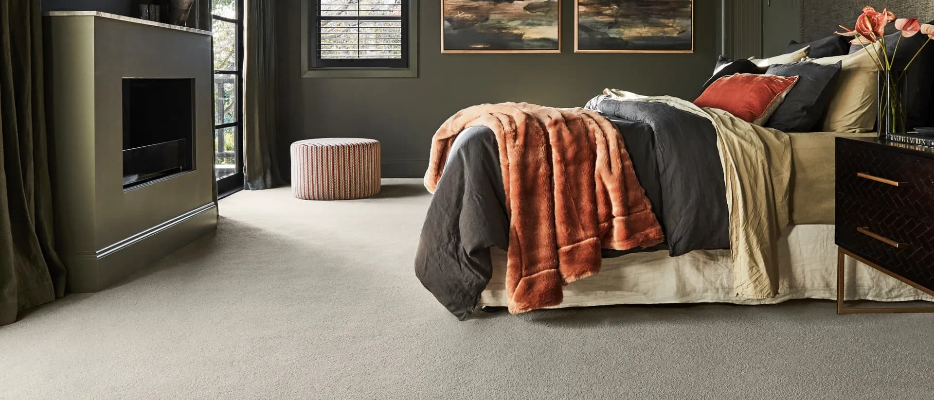 Essington — dark green bedroom, rust fur throw, fireplace