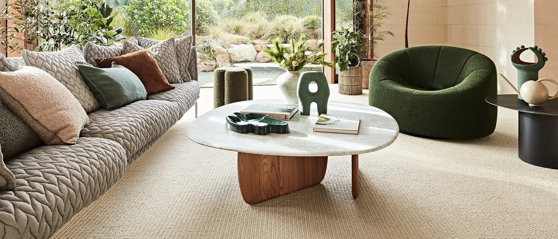 Opulent Weave — living room opening to garden, green boucle armchair