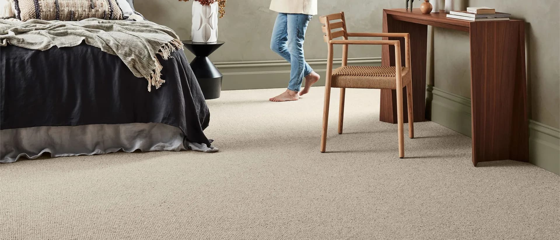 Luxury Living — bedroom scene, warm neutral looped wool underfoot