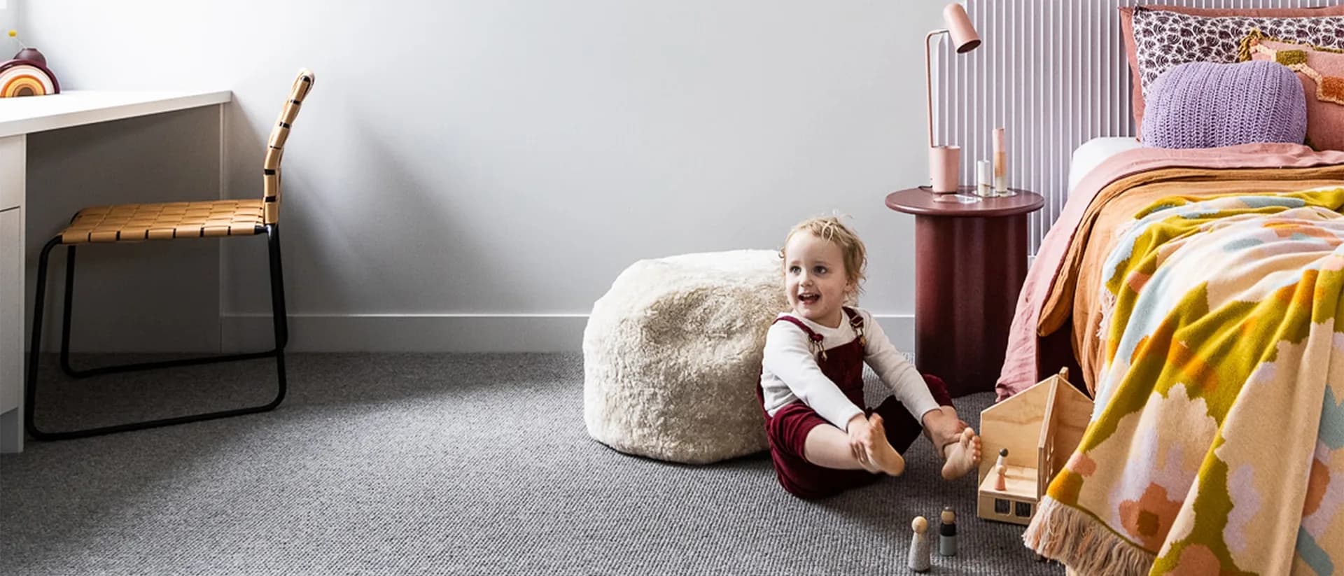 Petra wool loop pile carpet in a child's bedroom, mid-grey, fitted wall to wall