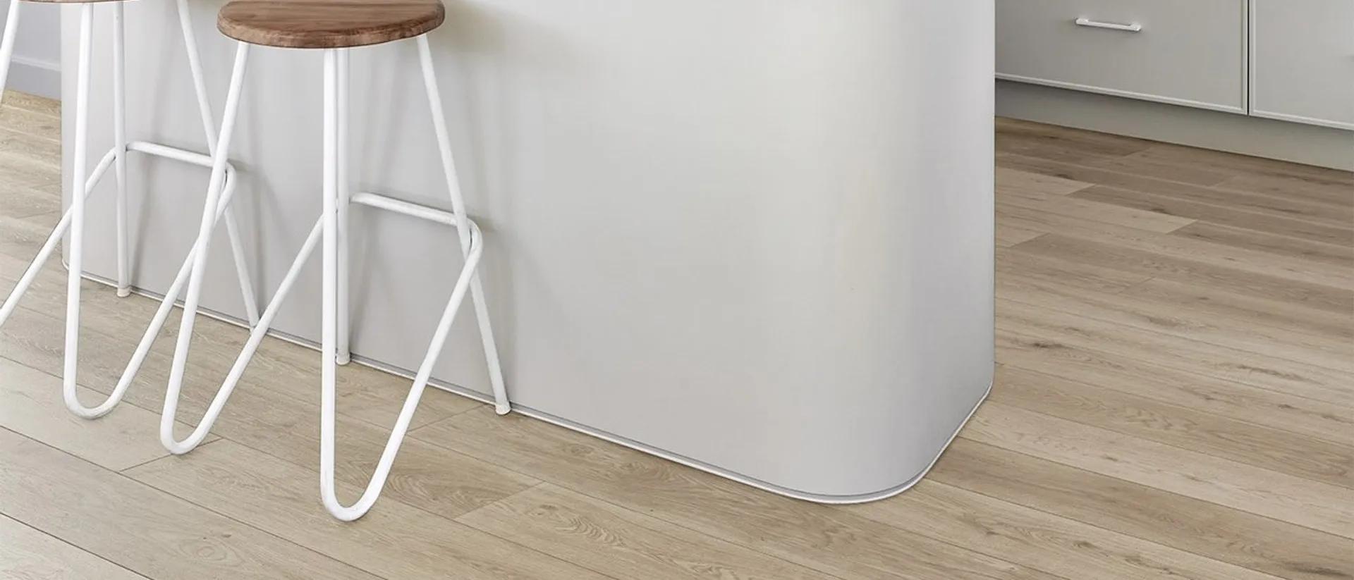 Aspect — curved white kitchen island on light laminate