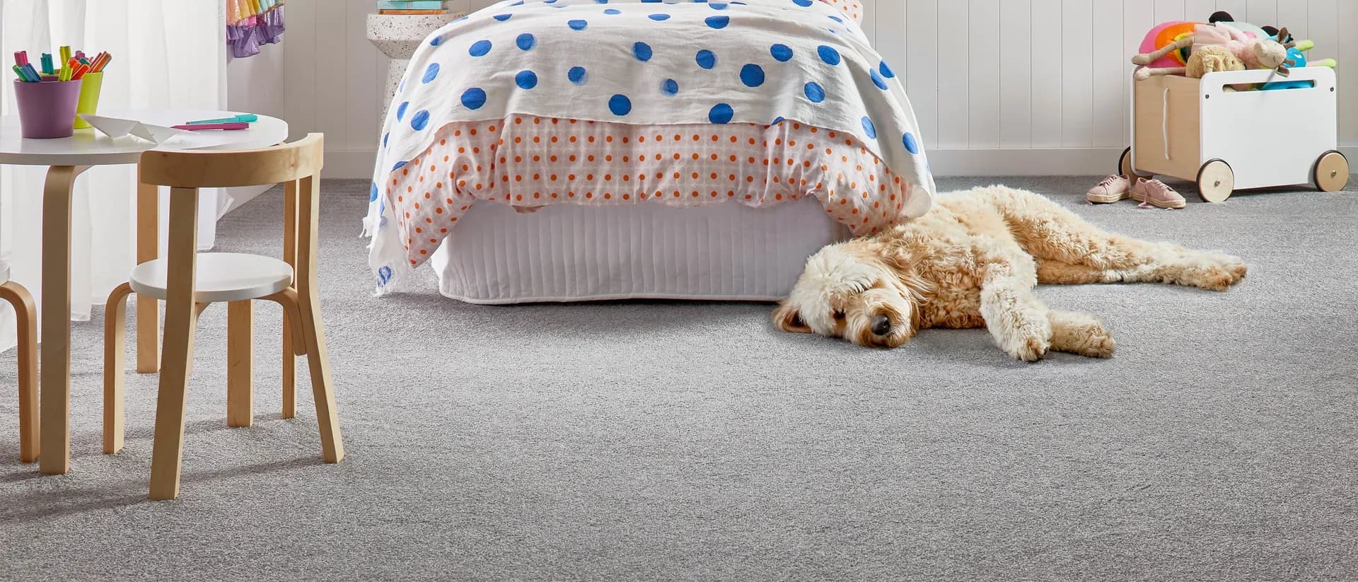 Infatuation — kids bedroom with dog resting on grey carpet