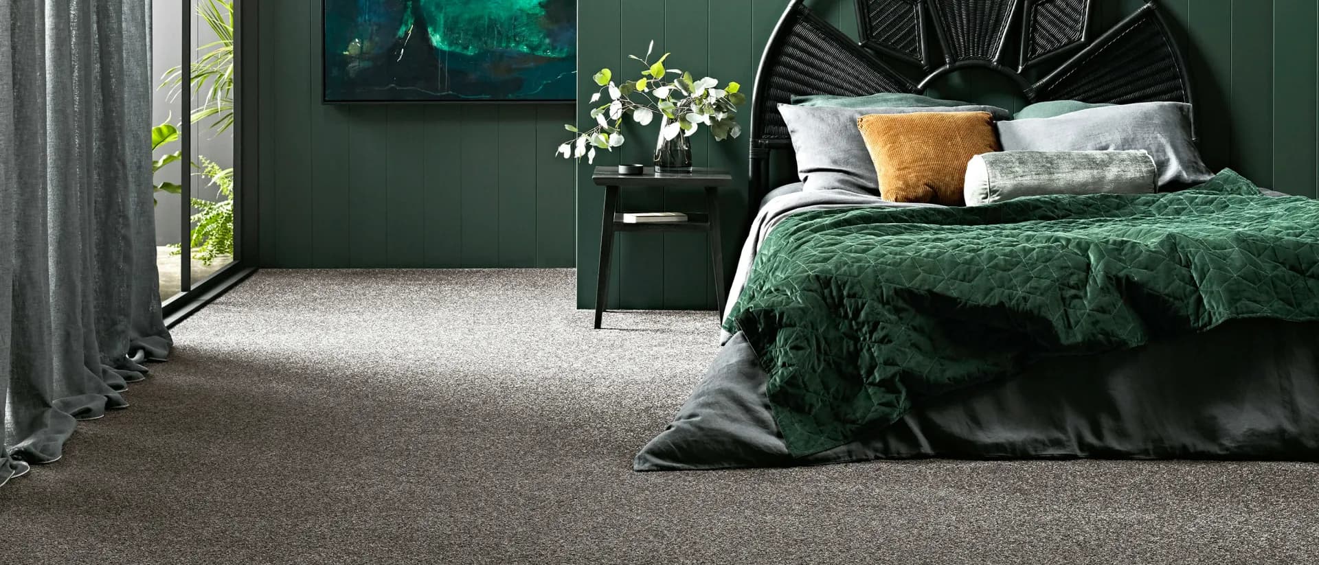 Revive — dark green bedroom with grey carpet and daylight